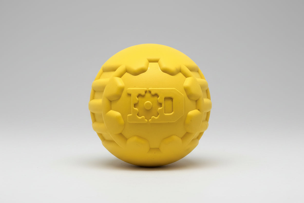Yellow textured ball with a logo on a white background
