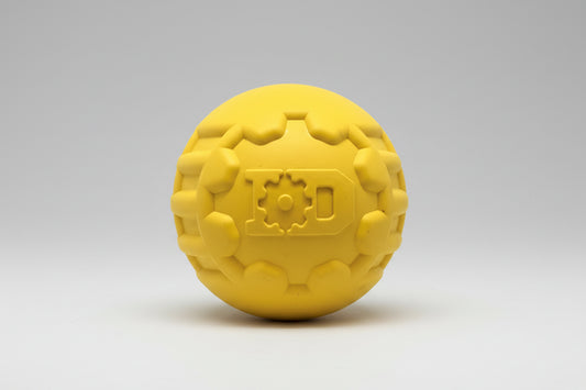 Yellow textured ball with a logo on a white background